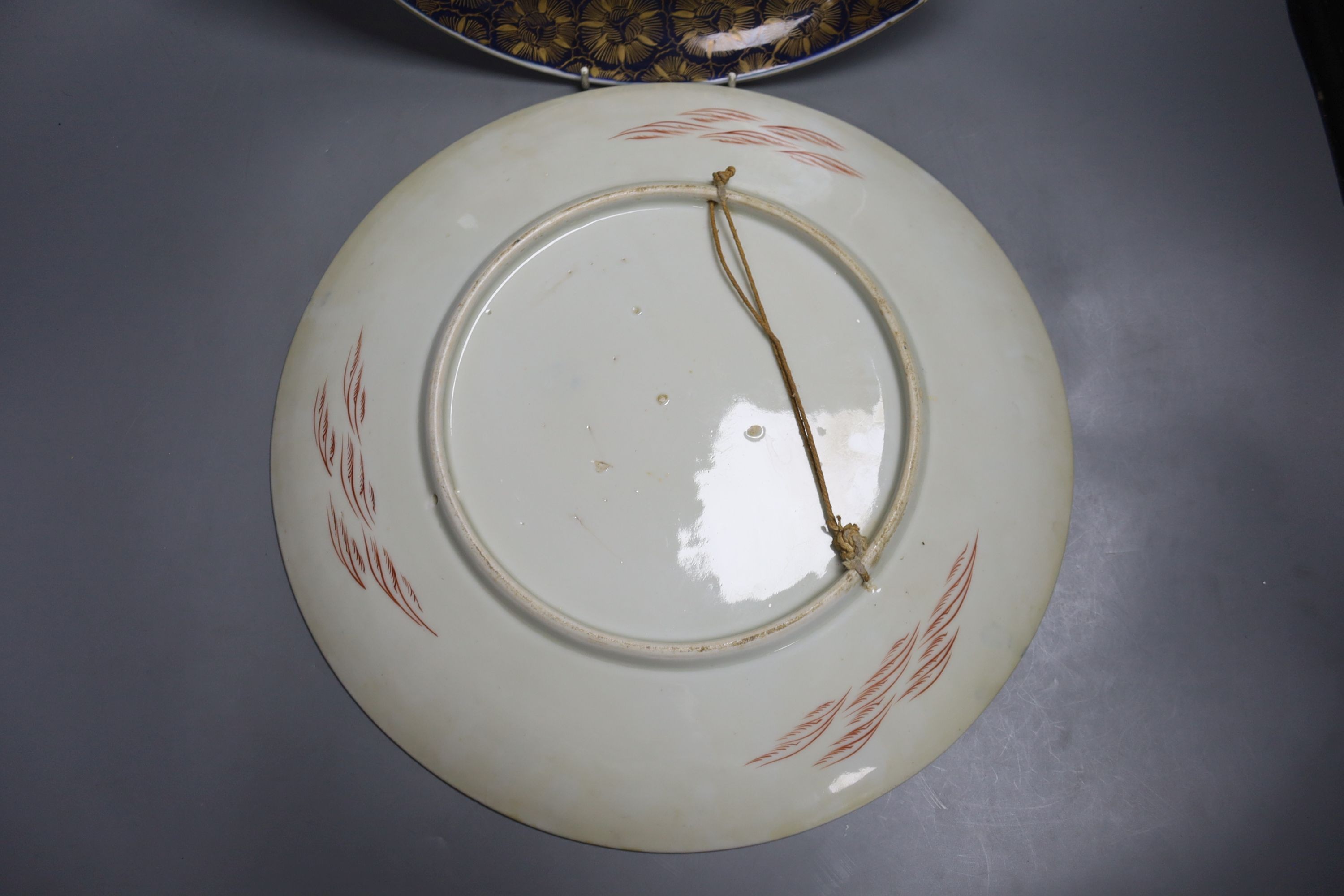 A pair of Japanese enamelled porcelain dishes, Meiji period, 36.5cm.